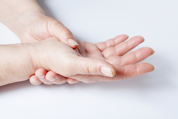 Woman hands over a white background